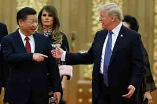 Chinese President Xi Jinping with US President Trump. (Thomas Peter - Pool/Getty Images)