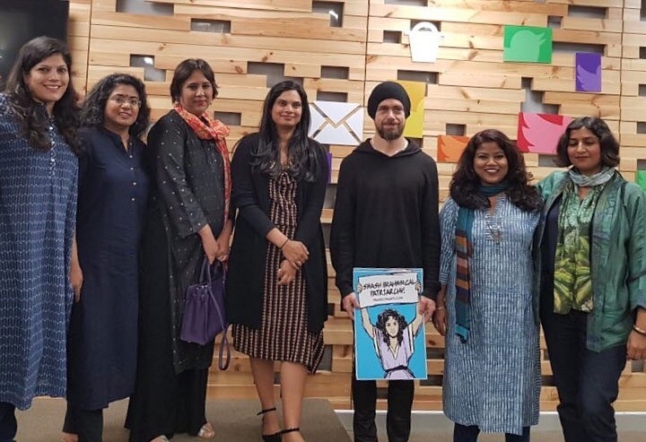 Twitter CEO Jack Dorsey holding the ‘Smash Brahminical Patriarchy’ placard (@annavetticad/Twitter)