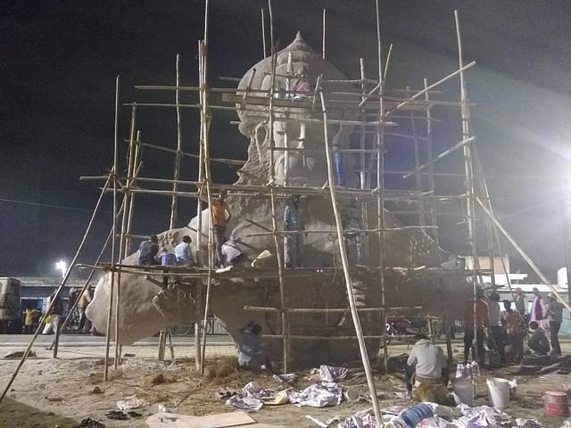 Work in full swing at night to make PoP statue of Lord Hanuman