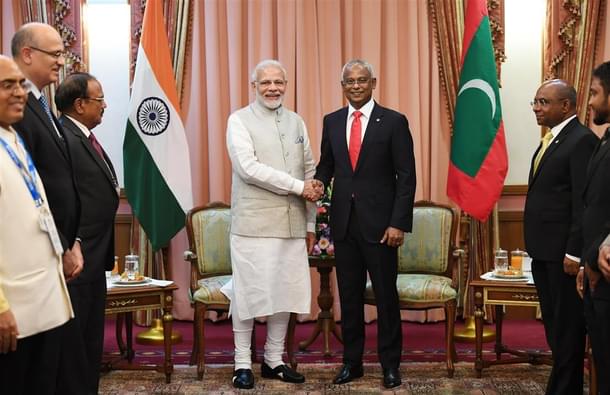 Prime Minister Modi meets President Solih during his visit to the latter’s swearing-in ceremony in Malé. (PMO India via Twitter)
