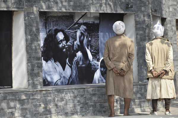 Sikh people watching the installation of the Baba Banda Singh Bahadur’s statue at Nabha House, the Wall of Truth memorial to the victims of the 1984 anti-Sikh riots and the museum at Bangla Sahib Gurdwara,  in New Delhi. (Raj K Raj/Hindustan Times via Getty Images)