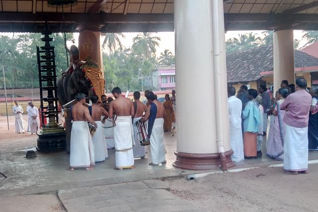 An evening ritual at the famous Sree Krishna Temple at Thriprayar. Only a handful of Sabarimala pilgrims are visiting the temple, a 45-minute drive to Guruvayur.