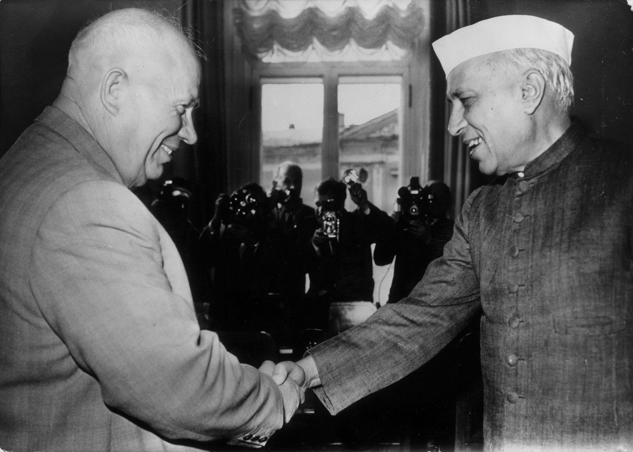 Jawaharlal Nehru  shakes hands with then Soviet premier Nikita Khrushchev in Moscow. Keystone/GettyImages)&nbsp;
