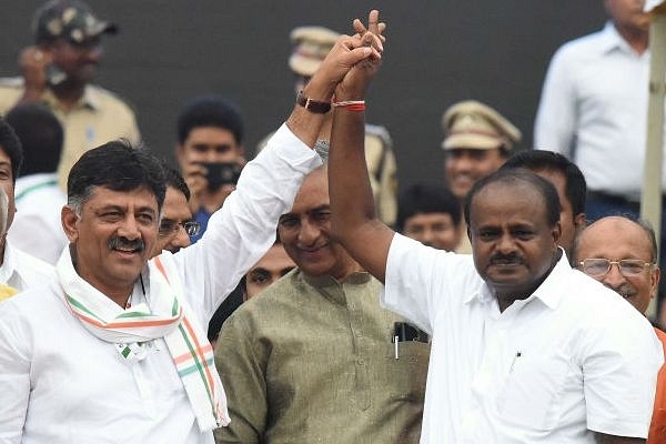 Congress leader DK Shivkumar with Chief Minister Kumarswamy (Arijit Sen/Hindustan Times via Getty Images)