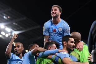 Manchester City celebrate their third goal against Manchester United (Laurence Griffiths/Getty Images)
