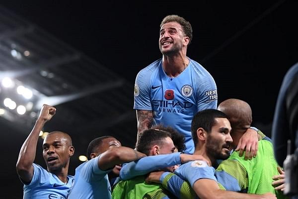 Manchester City celebrate their third goal against Manchester United (Laurence Griffiths/Getty Images)