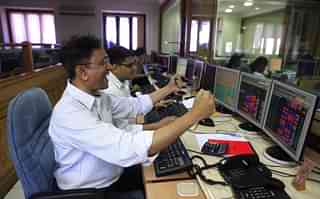 Stock traders rejoice the as Sensex rose at Bombay stock exchange. (Representative image) (Anshuman Poyrekar/Hindustan Times via Getty Images)&nbsp;