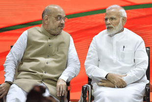 BJP national president Amit Shah with Prime Minister Narendra Modi during the two-day meeting of the BJP’s national executive in New Delhi. (Sonu Mehta/Hindustan Times via Getty Images)