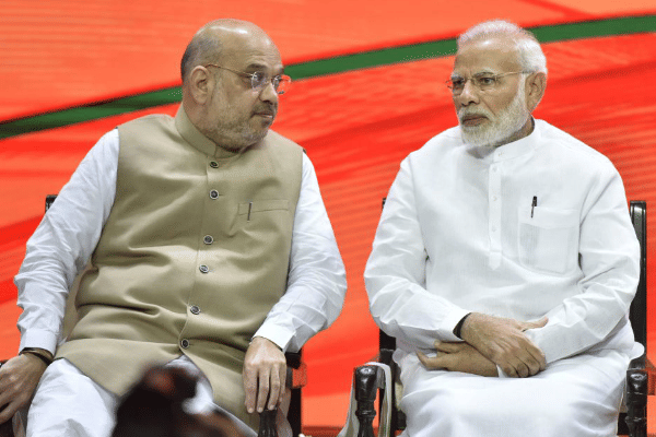BJP national president Amit Shah with Prime Minister Narendra Modi during the two-day meeting of the BJP’s national executive in New Delhi. (Sonu Mehta/Hindustan Times via Getty Images)