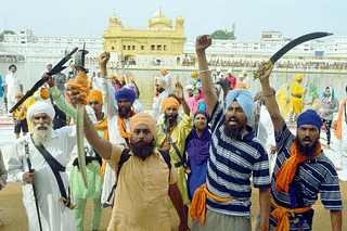 Sikh hardliners brandishing swords and raising pro-Khalistan slogans on the anniversary of Operation Blue Star at Golden Temple complex in 2018 in Amritsar. (Sameer Sehgal/Hindustan Times via Getty Images)