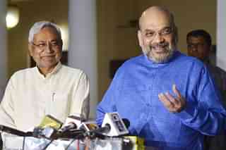 Bihar Chief Minister Nitish Kumar (L) with BJP Chief Amit Shah. (K Asif/India Today Group/Getty Images)