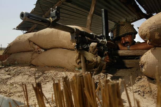 Soldier at the border bunker (Photo by Paula Bronstein/Getty Images) 