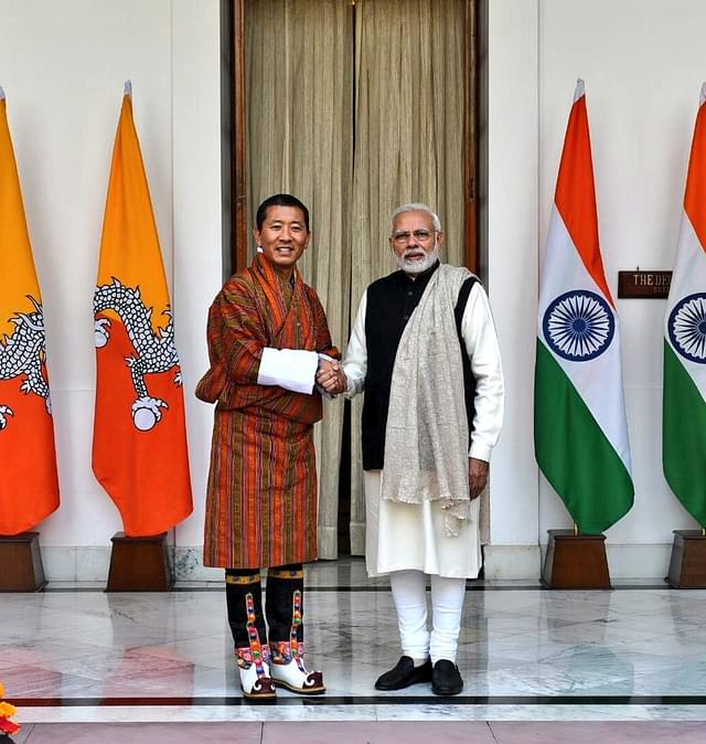 PM Narendra Modi welcomes PM of Bhutan  Dr Lotay Tshering (Image courtesy of twitter.com/MEAIndia)