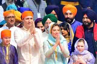 Canadian Prime Minister Justin Trudeau and his wife Sophie Gregoire Trudeau with their children at Golden Temple in Amritsar. (Sameer Sehgal/Hindustan Times via GettyImages)