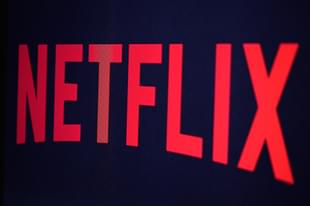 In this photo illustration the Netflix logo is seen on September 19, 2014 in Paris. (Photo by Pascal Le Segretain/Getty Images)