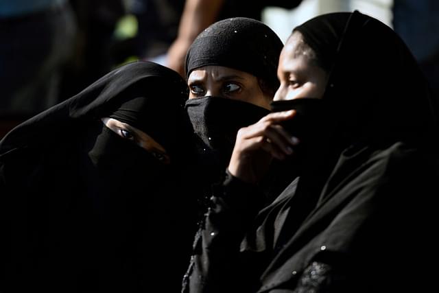 Muslim women celebrating as the Narendra Modi Cabinet approved an ordinance to criminalise instant triple talaq last year. (Photo by Amal KS/Hindustan Times via Getty Images)
