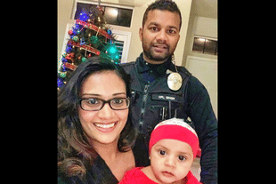 Corporal Ronil Singh with his family. (pic via Twitter)