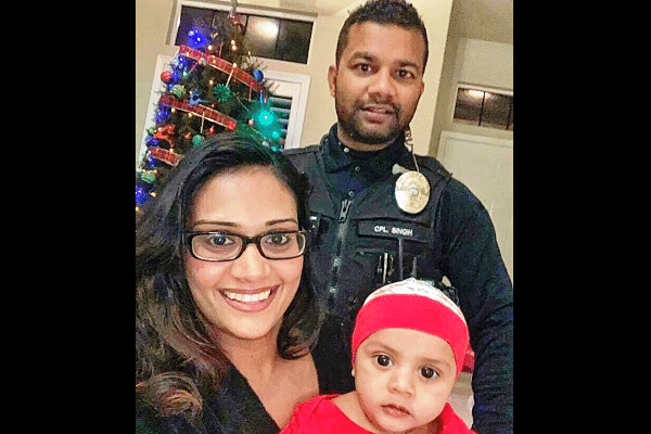 Corporal Ronil Singh with his family. (pic via Twitter)