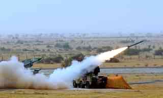 Medium-range mobile surface-to-air Akash Missiles being fired during Indian Air Force firepower show, ‘Exercise Iron Fist’ on 18 March 2016 in the desert of Pokhran, India. (Sonu Mehta/Hindustan Times via Getty Images)&nbsp;