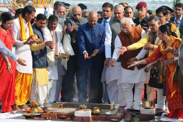 President Ram Nath Kovind (C) with Governor Haryana Kaptan Singh Solanki, CM Haryana Manohar Lal Khattar and, Governor Himachal Acharya Dev Vrat during an inauguration of International Gita Mahotsav 2017 at  Brahma Sarover, on November 25, 2017 in Kurukshetra. (Photo by Anil Dayal/Hindustan Times via Getty Images)