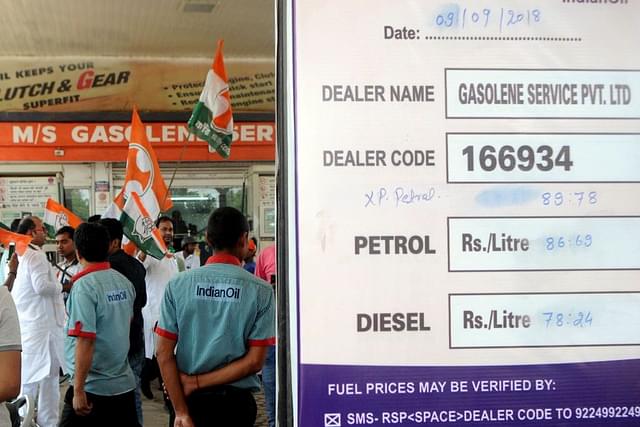 Youth Congress members forcefully close a petrol pump during  Bharat Bandh protest (Parwaz Khan/Hindustan Times via Getty Images)