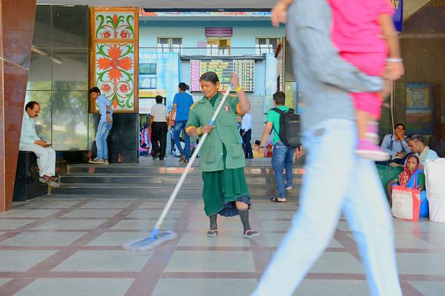 Cleanliness drive at the Bengaluru railway station after a launch of the Swachh Bharat Abhiyan by Prime Minister Modi in 2015. (Hemant Mishra/Mint via Getty Images)
