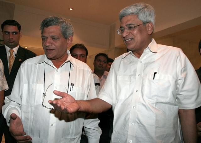  CPI [M] leaders Sitram Yechury with Prakash Karat (Photo by Sonu Mehta/Hindustan Times via Getty Images)