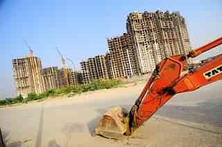 An under construction Amrapali Group building from 2011. (Photo by Pradeep Gaur/Mint via Getty Images)