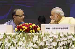 PM Modi with FM Arun Jaitley. (Virendra Singh Gosain/Hindustan Times via Getty Images)