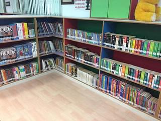 Books for differently-abled children sit on low-built shelves&nbsp;
