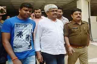 Vinod Verma after being picked up by police in Ghaziabad. (Sakib Ali/Hindustan Times via Getty Images)