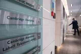 Signs for company Cambridge Analytica in the lobby of the building in which they are based in London. (Chris J Ratcliffe/Getty Images)