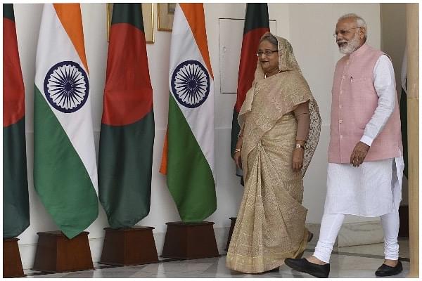 Prime Minister Narendra Modi with Bangladeshi Prime Minister Sheikh Hasina before their delegation level meeting at Hyderabad House, on April 8, 2017 in New Delhi, (Mohd Zakir/Hindustan Times via Getty Images)