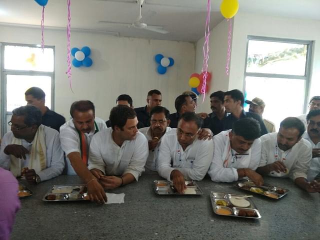 Rahul Gandhi along with Karnataka Congress leaders at an Indira Canteen in Bengaluru. (Image courtesy of twitter.com/DrParameshwara)&nbsp;