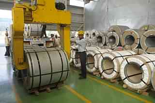 Steel rolls at a processing centre in Pune, Maharashtra. (Photo by ABHIJIT BHATLEKAR/Mint via Getty Images)