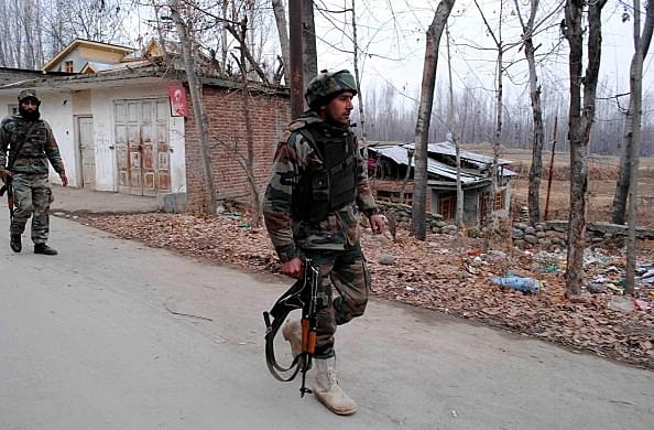 Indian Army soldiers return from an encounter site in Kashmir. (Waseem Andrabi/Hindustan Times via Getty Images)