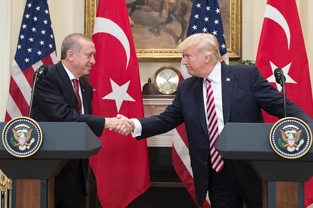 US President Donald Trump shakes hands with President of Turkey Recep Tayyip Erdogan (Michael Reynolds-Pool/Getty Images)