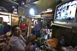 People watching TV at Road Side tea stall. (representative image) (Raj K Raj/Hindustan Times via Getty Images)