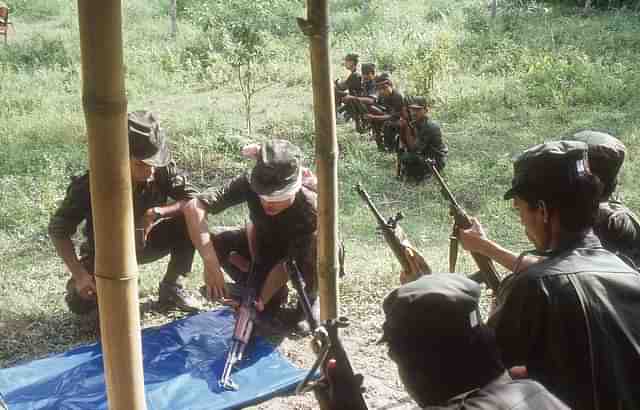 Militants are trained to use arms and ammunition at a training camp in the jungles of Assam. (Saibal Das/The India Today Group/Getty Images)&nbsp;