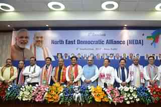 BJP president Amit Shah with Chief Minister of Arunachal Pradesh Pema Khandu, Chief Minister of Manipur N Biren Singh, Chief Minister of Assam Sarbananda Sonowal, Chief Minister of Nagaland T R Zeliang and Chief Minister of Sikkim Pawan Kumar Chamling during the 2nd Conclave of North-East Democratic Alliance (NEDA), in New Delhi. (K Asif/India Today Group/GettyImages)