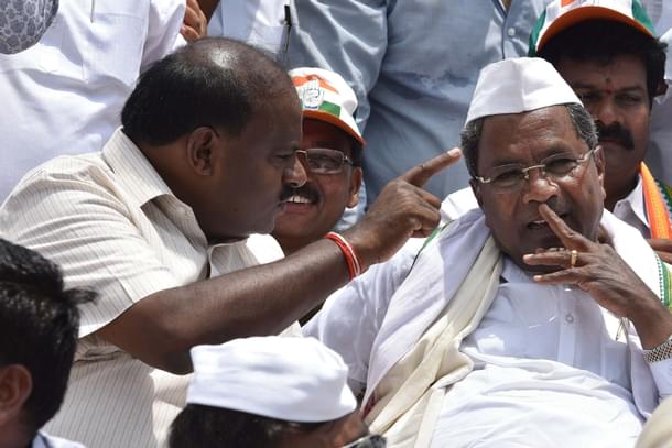 Siddaramaiah (R) with Kumaraswamy (L) (Arijit Sen/Hindustan Times via Getty Images)