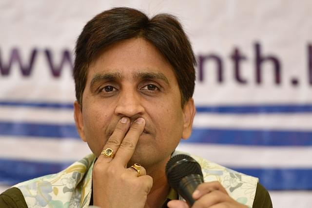 Kumar Vishwas in a moment of silence during the launch of an application and at Press Club of India on May 9, 2018 in New Delhi. (Photo by Sanchit Khanna/Hindustan Times via Getty Images)