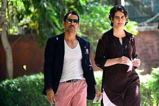 Robert Vadra with his wife Priyanka Gandhi going to cast the vote for general election of the 16th Lok Sabha 2014 on April 10, 2014 in New Delhi, India. (Photo by Priyanka Parashar/Mint via Getty Images)