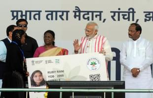 Prime Minister Narendra Modi gives a health card to beneficiaries as he launches Ayushman Bharat-National Health Protection Scheme on September 23, 2018 in Ranchi. (Photo by Parwaz Khan/Hindustan Times via Getty Images)