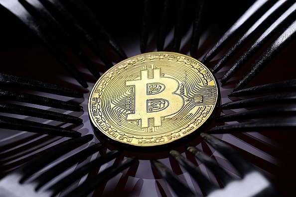 A visual representation of blockchain based cryptocurrency Bitcoin. (Dan Kitwood/Getty Images)