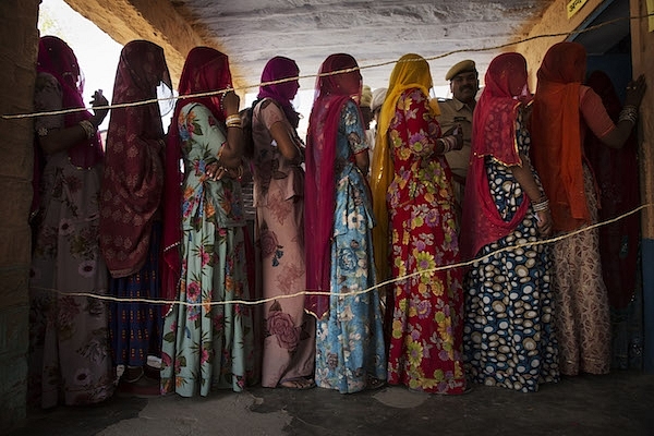 Representative image of Indian women waiting to vote at a polling station  (Kevin Frayer/Getty Images)