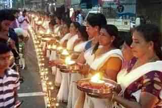 Women taking part in ‘Ayyappa Jyoti’ organised by Sabarimala Karma Samiti to protect the customs of Sabarimala temple.