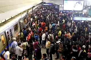 Passengers waiting for Delhi metro (Amal KS/Hindustan Times via Getty Images)
