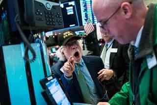Traders work on the floor of the New York Stock Exchange (NYSE) (Drew Angerer/Getty Images)