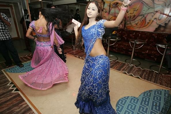Bar girls at a dance bar in Mumbai’s Andheri West. (Photo by VIjayanand Gupta/Hindustan Times via Getty Images)